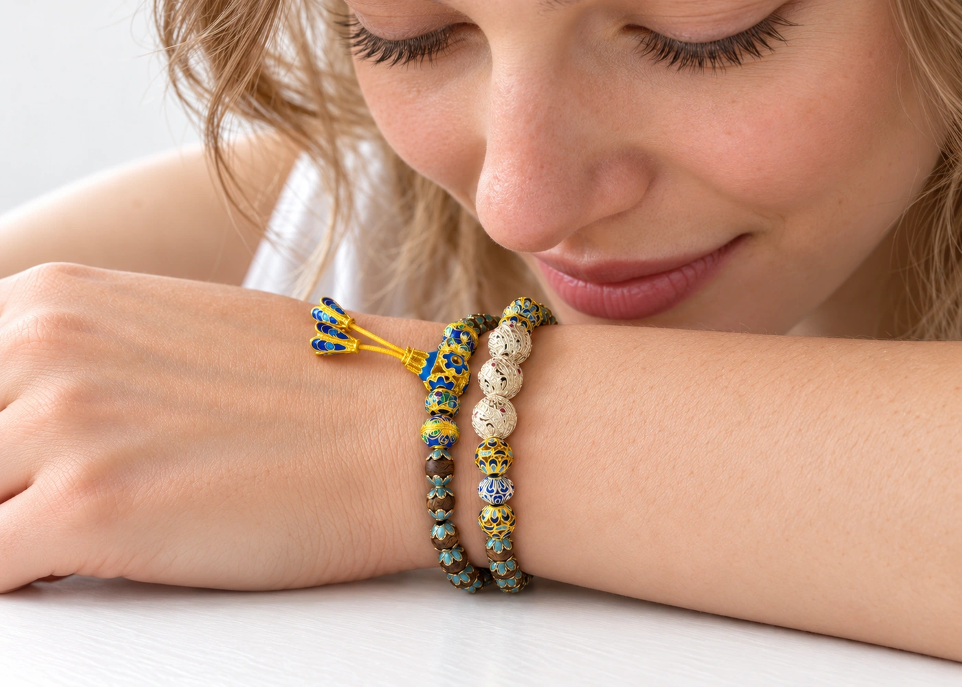Steady as You Are agarwood and enamel bracelet worn close to the face